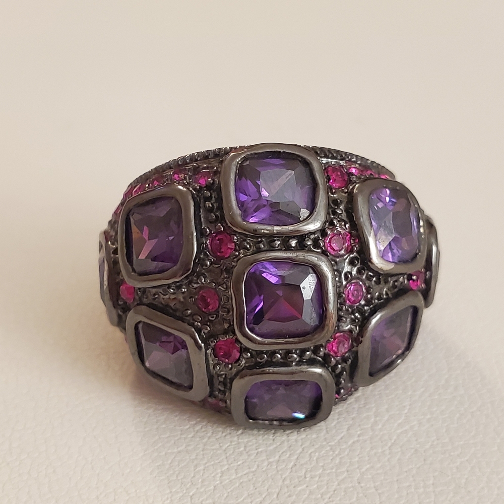 Purple/ pinkish red stone heavy ring